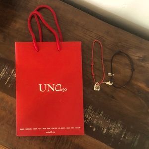UNO de 50 - Red rope bracelet and black rope bracelet new w/bag.